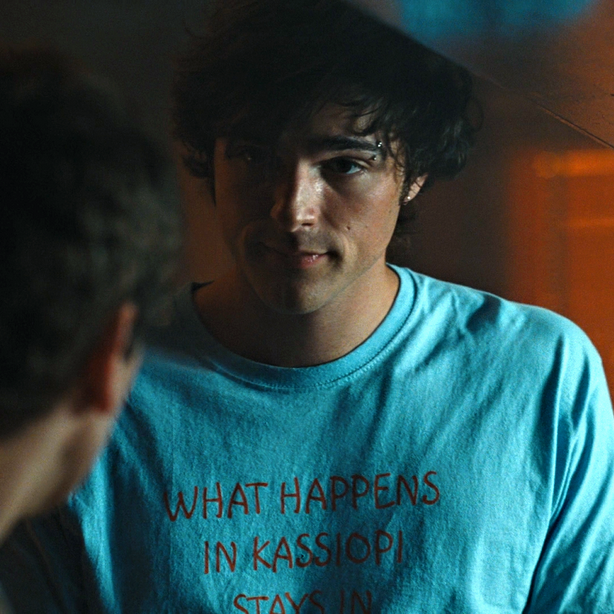 What Happens In Kassiopi Stays In Kassiopi Felix Catton Saltburn Unisex Heavy Cotton Tee